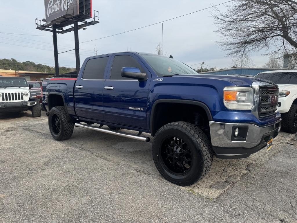 2014 GMC Sierra 4WD Crew Cab SLE LWB's photo
